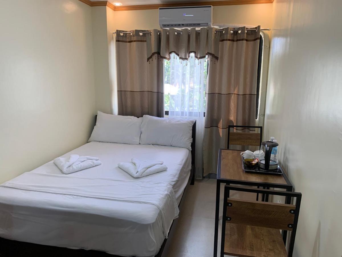 Zl Travelers Inn Batuan المظهر الخارجي الصورة